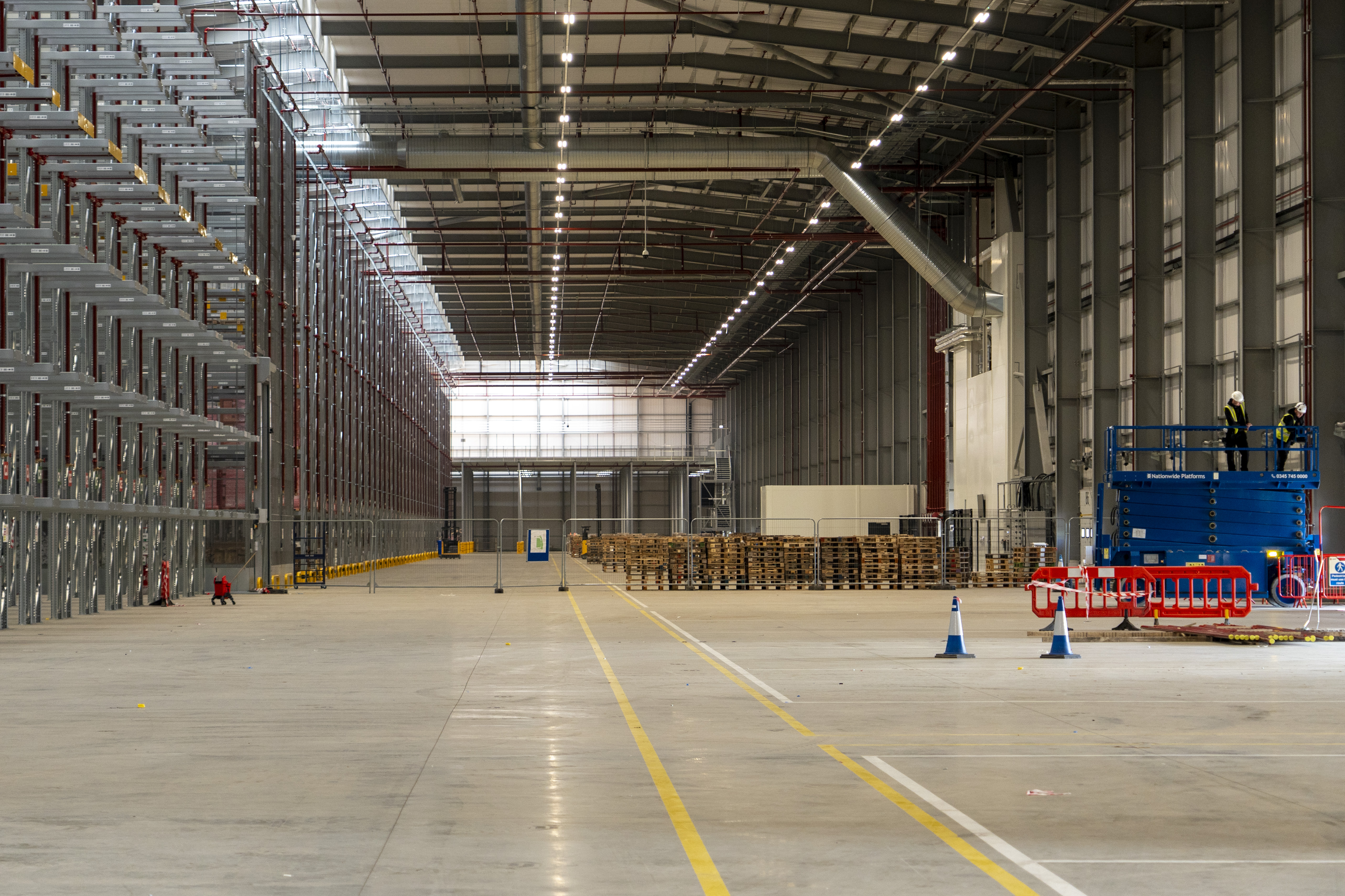 Phased warehouse handover to allow for operations to begin quickly